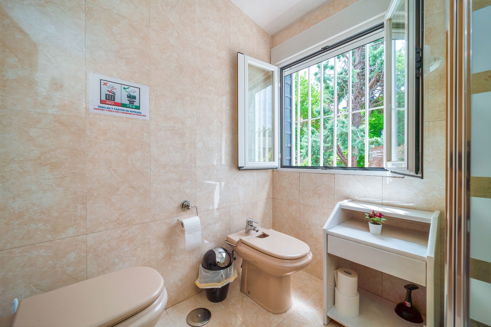 Bathroom with open window letting in natural light and fresh air showing effective ventilation to prevent mould growth