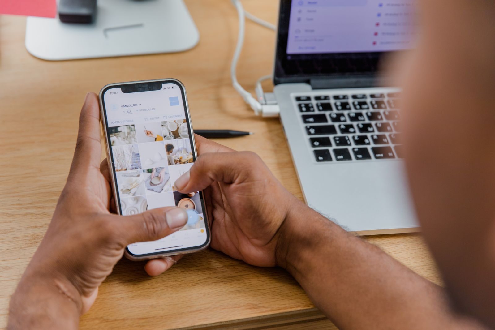 Someone using a phone to check a product against an online register