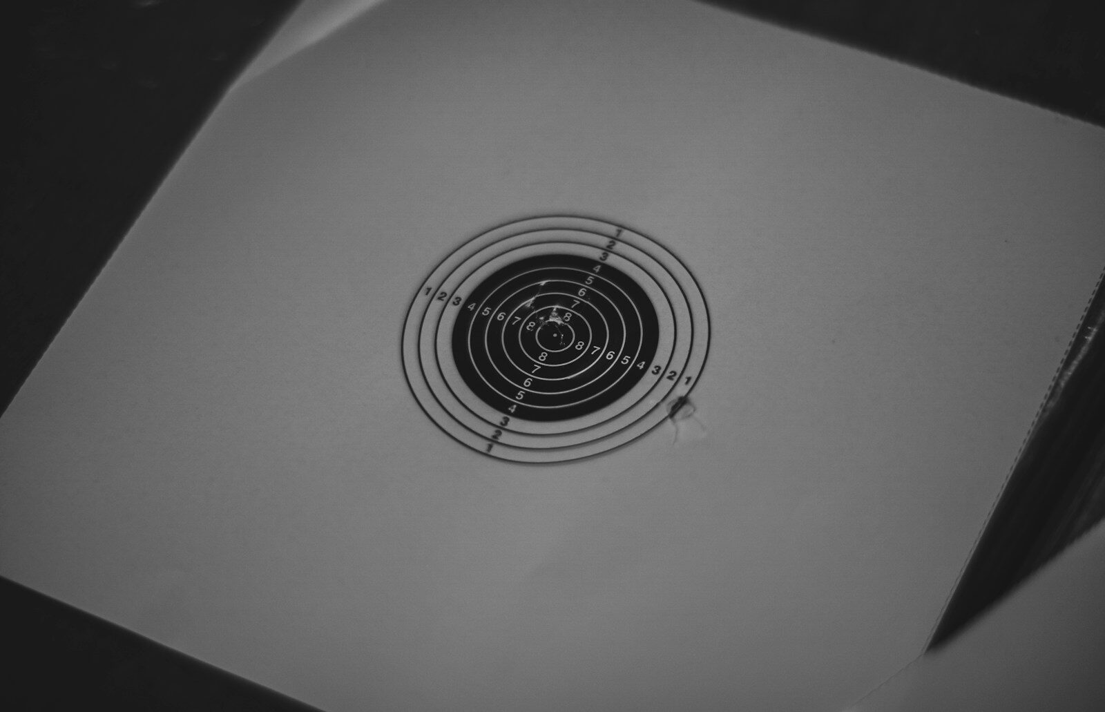 Close-up of a round bathroom extractor fan grille